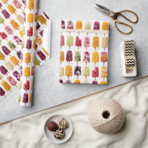 Assorted Frozen Fruit Popsicles on White Wrapping Paper