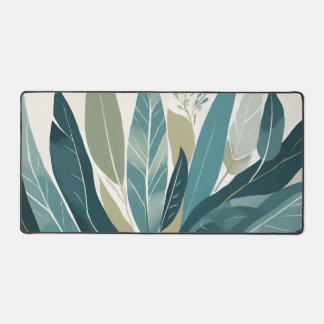 Assorted leaves in shades of green desk mat