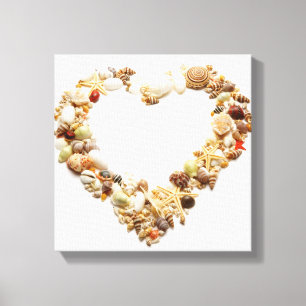 Assorted seashells form heart shape canvas print