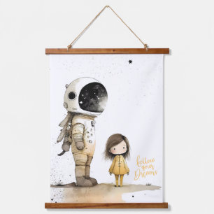 Astronaut and girl hanging tapestry