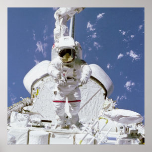 Astronaut attached to Remote Manipulator System Poster