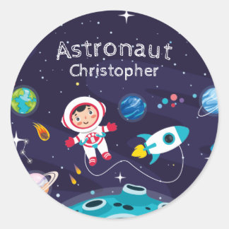 Astronaut child on the moon, monogrammed name  classic round sticker