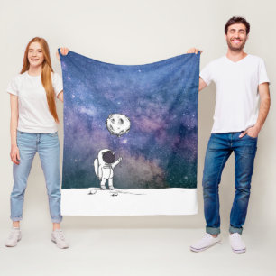 Astronaut in space with moon balloon cosmos stars fleece blanket