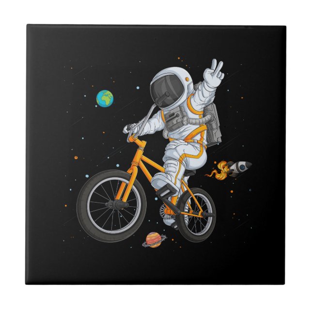 astronaut in spacesuit riding bmx bike on space ov tile (Front)