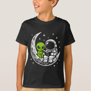 Astronaut reading book alien moon space T-Shirt