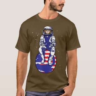 Astronaut Sitting On Planet American Flag 4th July T-Shirt