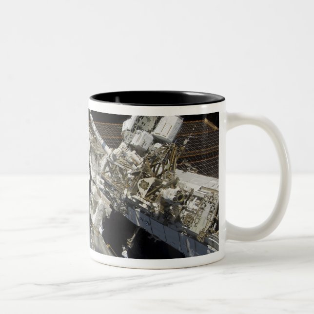 Astronauts perform a series of tasks Two-Tone coffee mug (Right)
