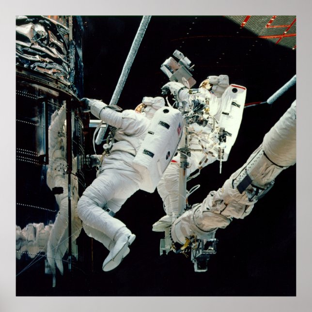 Astronauts working on the Hubble Poster (Front)