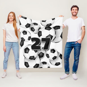 athlete jersey number on group of soccer balls fleece blanket