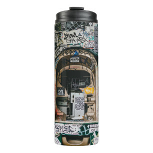 ATM MACHINE WITH GRAFFITI THERMAL TUMBLER