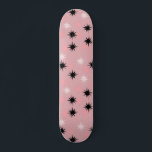 Atomic Pink Starbursts Skateboard Deck<br><div class="desc">This Atomic Pink Starbursts Skateboard Deck has all of the mid century modern fun of your grandma’s kitchen, minus the sticky linoleum. The kitschy design features a pink background with gold speckles and randomly placed starbursts in black and two shades of pink. This vintage inspired pattern is mod enough to...</div>