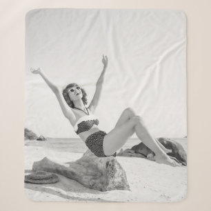 Attractive young woman in bikini on the beachvinta sherpa blanket