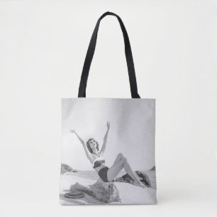 Attractive young woman in bikini on the beachvinta tote bag