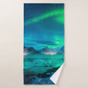 Aurora borealis over the sea coast, snowy mountain bath towel