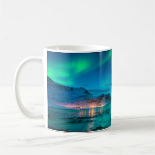 Aurora borealis over the sea coast, snowy mountain coffee mug