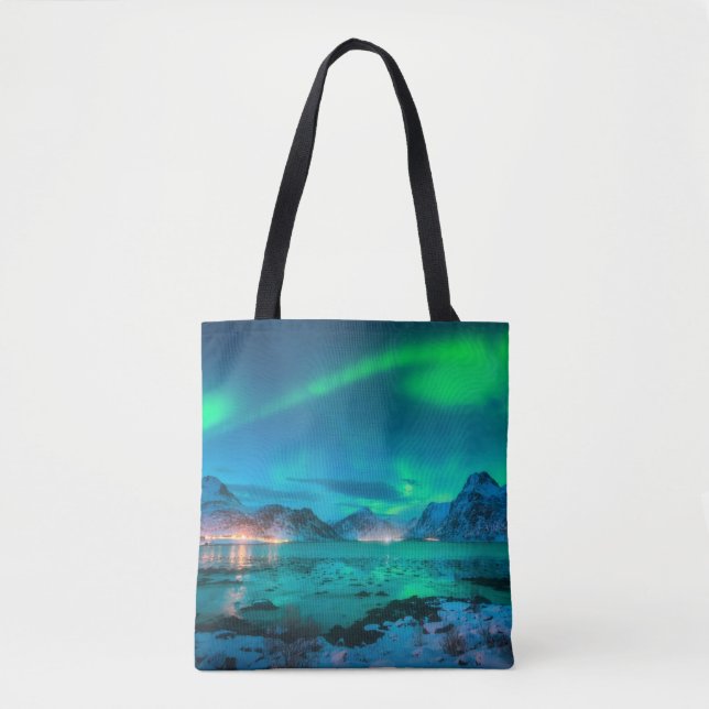 Aurora borealis over the sea coast, snowy mountain tote bag (Front)