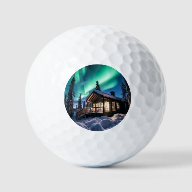 Aurora borealis over winter cabin golf balls (Front)