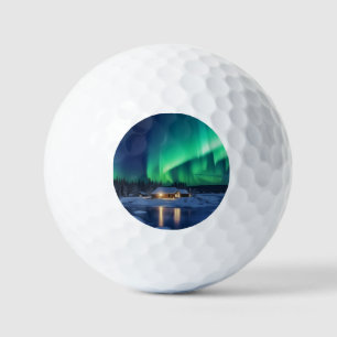 Aurora borealis over winter cabin golf balls