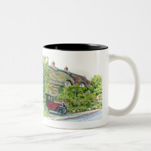 Austin 7 outside thatched cottage Two-Tone coffee mug