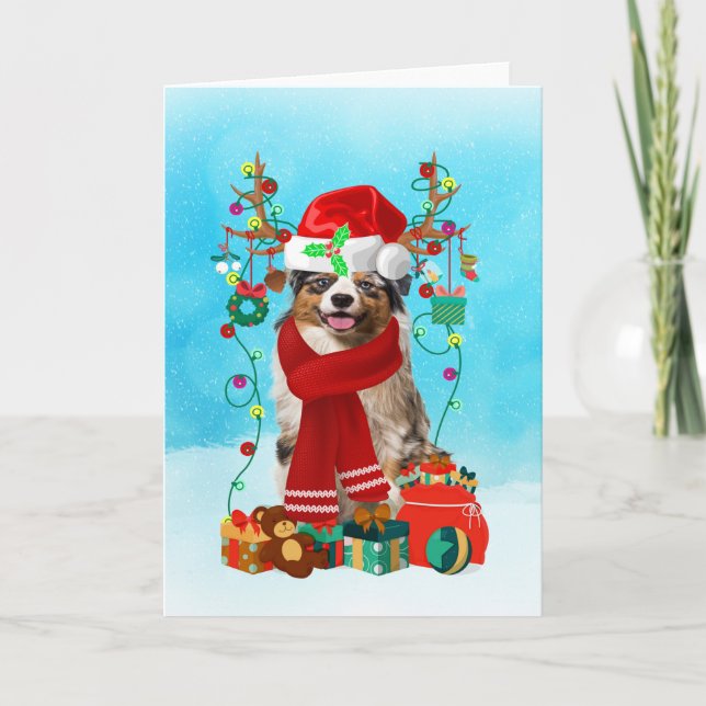 Australian shepherd in snow with Christmas gifts  Card (Front)
