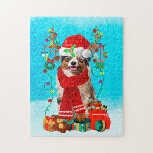Australian shepherd in snow with Christmas gifts  Jigsaw Puzzle