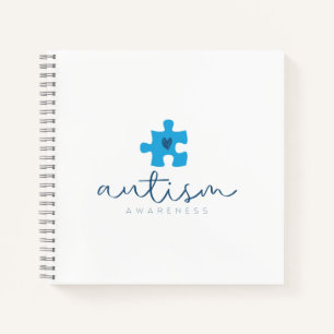 autism awareness blue puzzle piece heart notebook