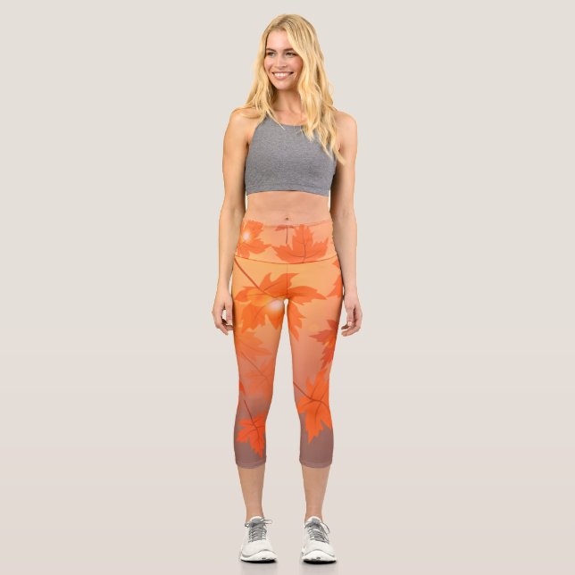 Autumn design with maple leaves and bokeh effect   capri leggings (Front)