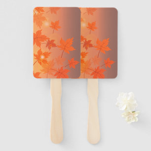 Autumn design with maple leaves and bokeh effect  hand fan