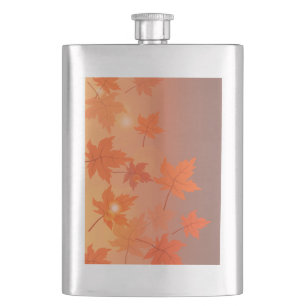 Autumn design with maple leaves and bokeh effect hip flask