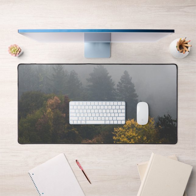 Autumn forest wrapped in fog desk mat (Office 1)