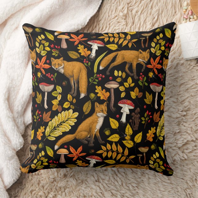 Autumn foxes on black cushion (Blanket)