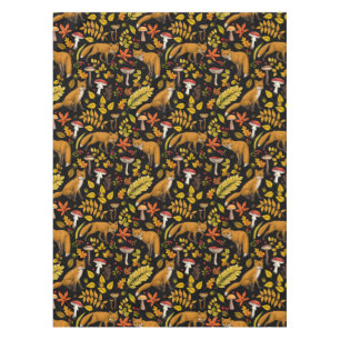 Autumn foxes on black tablecloth