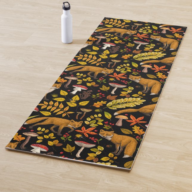 Autumn foxes on black yoga mat (In Situ)