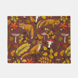 Autumn foxes on chocolate brown doormat