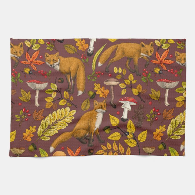 Autumn foxes on chocolate brown tea towel (Horizontal)