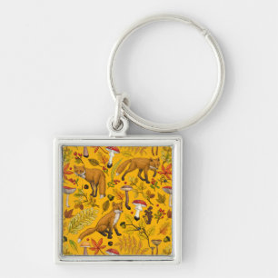 Autumn foxes on orange key ring