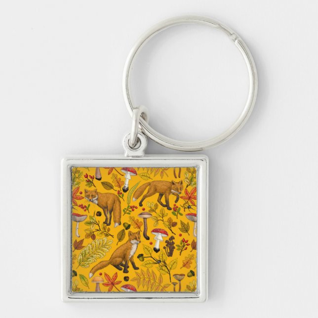 Autumn foxes on orange key ring (Front)