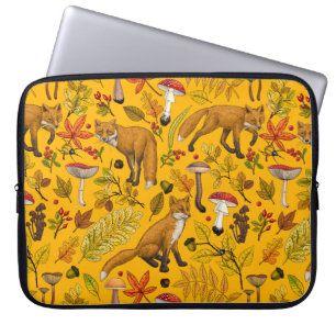 Autumn foxes on orange laptop sleeve