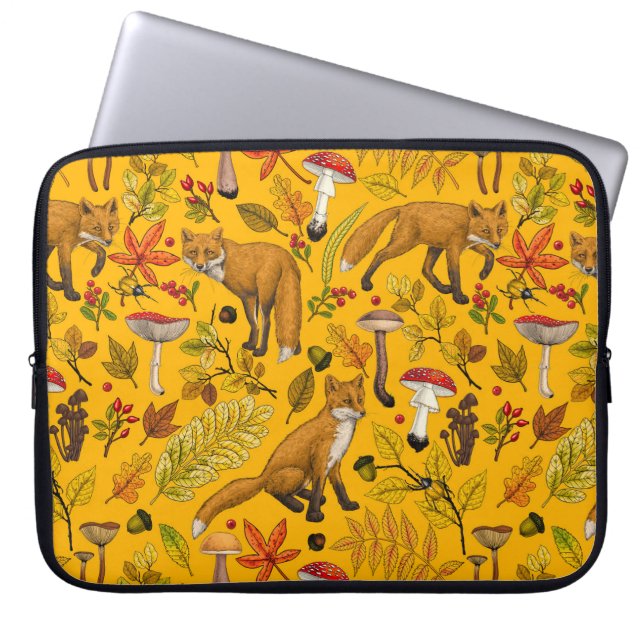 Autumn foxes on orange laptop sleeve (Front)