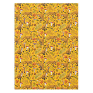 Autumn foxes on orange tablecloth