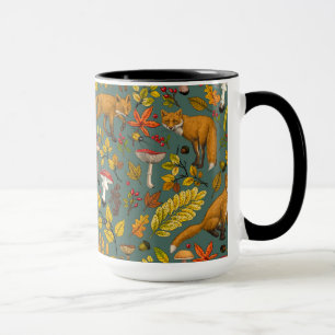 Autumn foxes on pine green mug