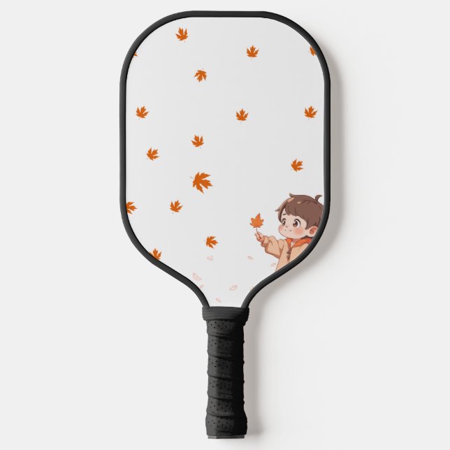 Autumn leaf held by a cute little boy pickleball paddle (Front)