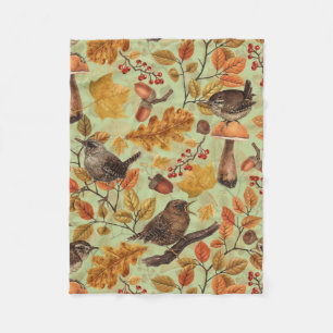 Autumn leaves, berries, mushrooms and wrens fleece blanket