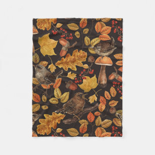 Autumn leaves, berries, mushrooms and wrens fleece blanket