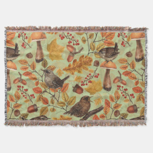Autumn leaves, berries, mushrooms and wrens throw blanket