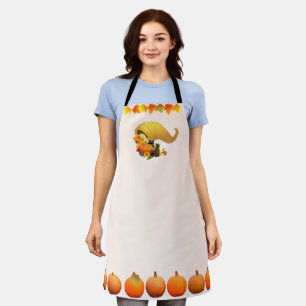 Autumn leaves, horn of plenty and pumpkins apron