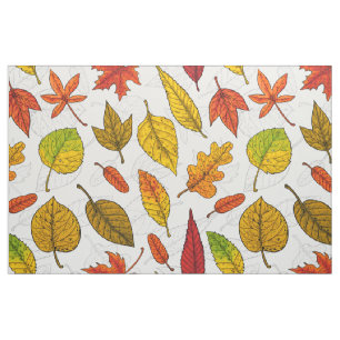 Autumn leaves on white fabric