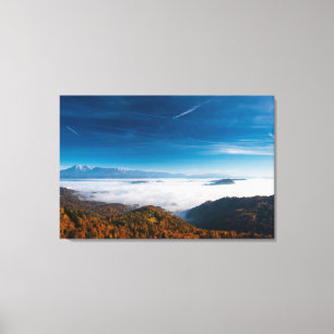 Autumn mountains and fog in the valley canvas print