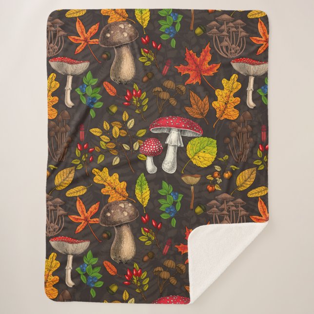 Autumn mushrooms, leaves, nuts and berries on dark sherpa blanket (Front)