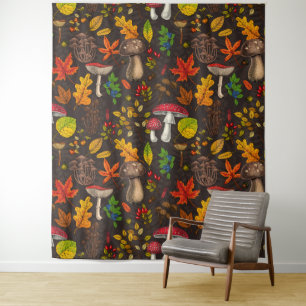 Autumn mushrooms, leaves, nuts and berries on dark tapestry